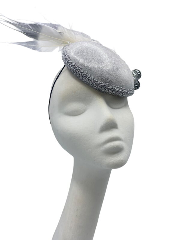 Stunning silver headpiece with cream into ombre silver spray of feathers.
